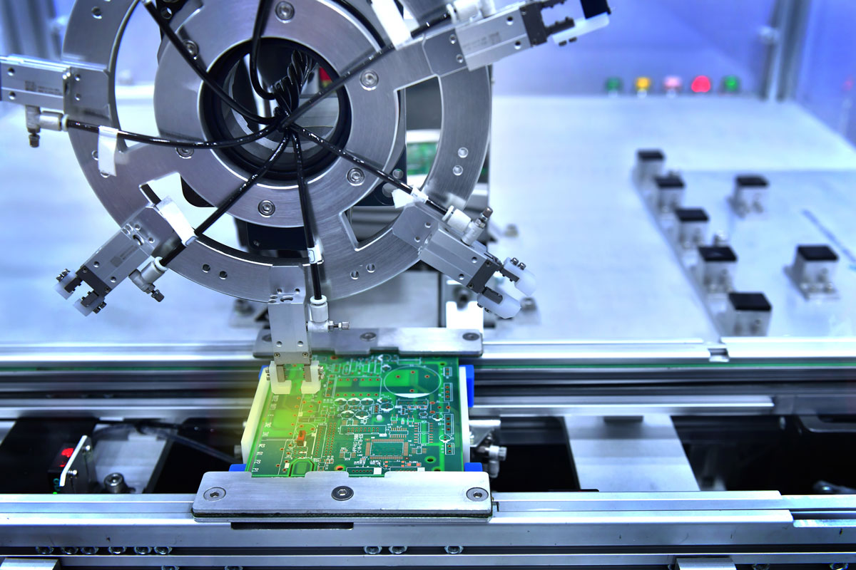 Advanced SMT machine in action at the WellCircuit factory.